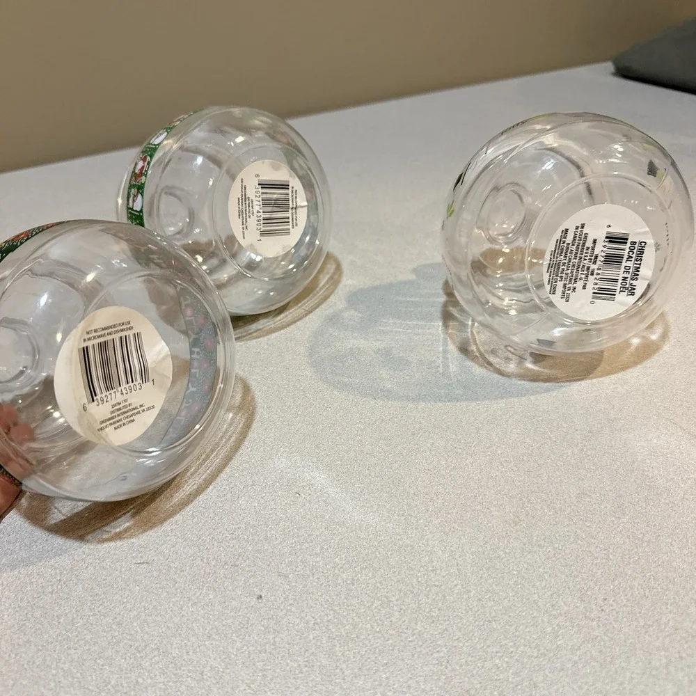 Christmas-themed Plastic apothecary or candy jars With Lids Jolly Snow Man Santa